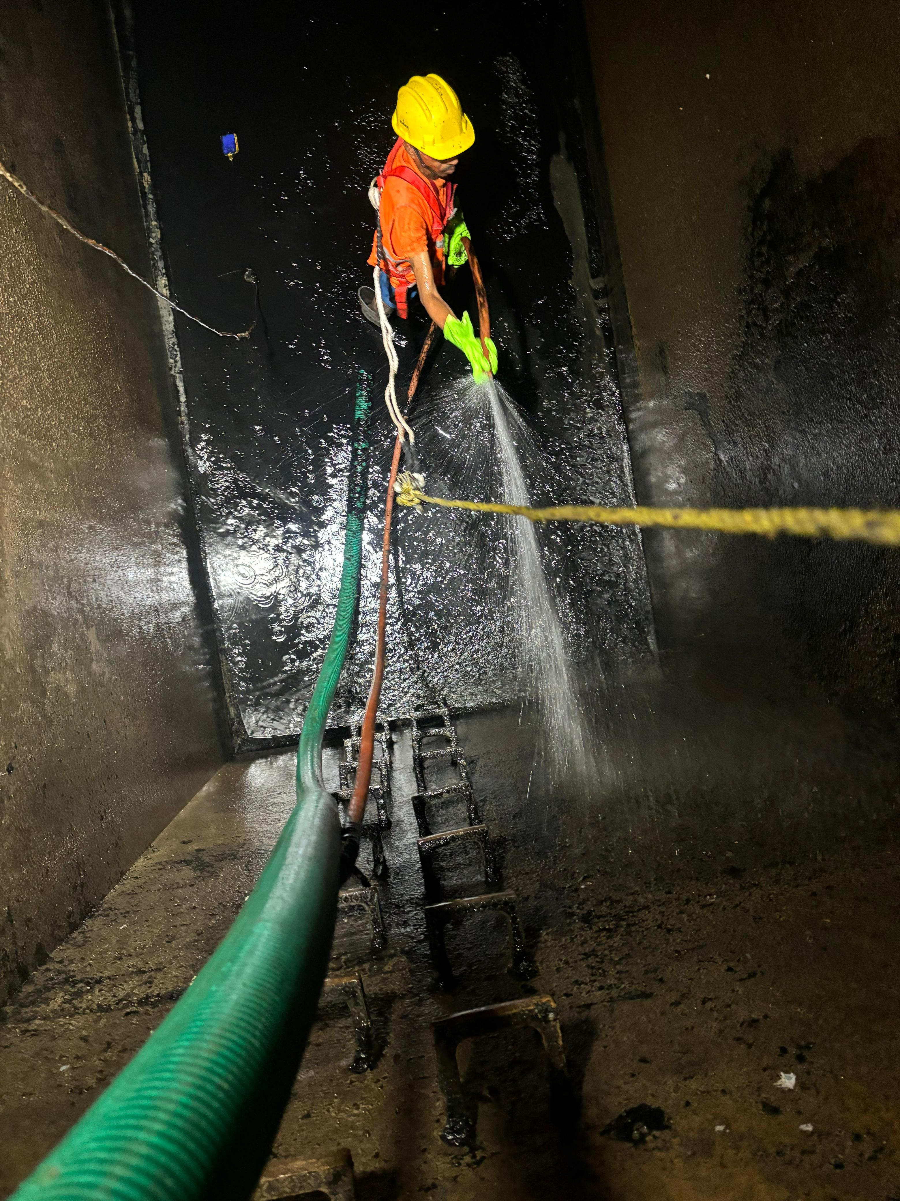 KKR technician servicing a residential septic tank